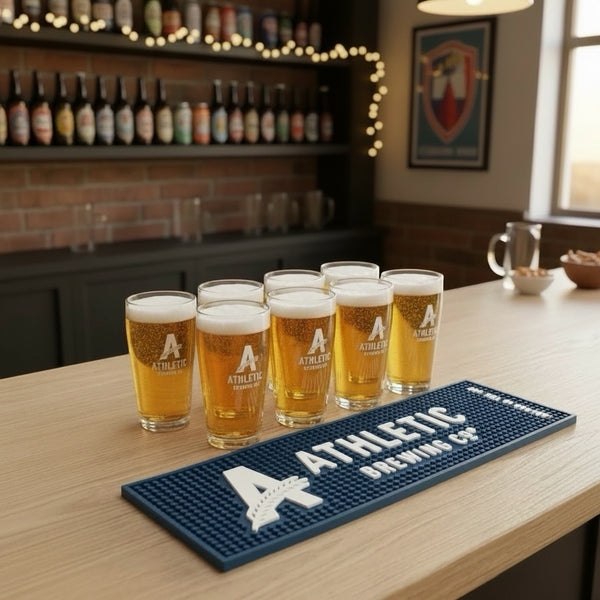 Athletic Brewing Co. Branded Pint Glass Set (8 Glasses + Bar Mat)