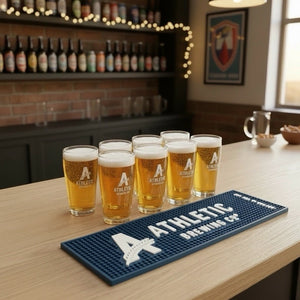 Athletic Brewing Co. Branded Pint Glass Set (8 Glasses + Bar Mat) - thebeerhoose.co.uk